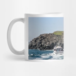 Tour boat visiting the bird colonies on the Farne Islands, Northumberland, UK Mug